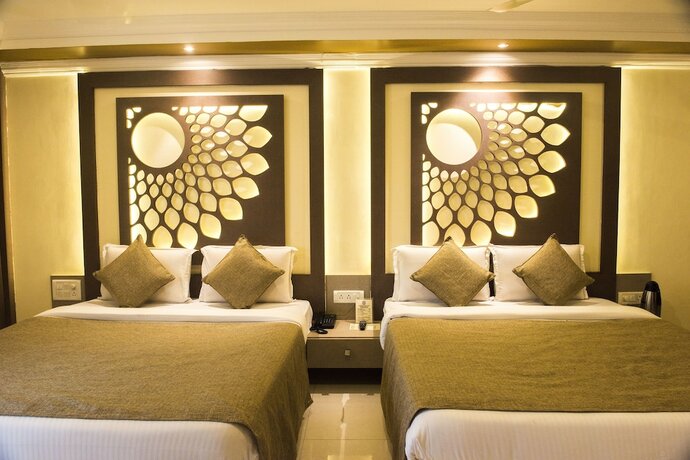 Imagen de la habitación del Hotel Pushpak. Foto 13