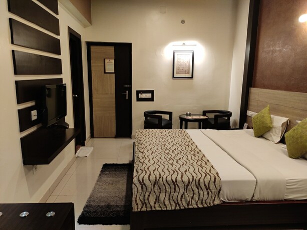 Imagen de la habitación del Hotel Pushpak. Foto 14