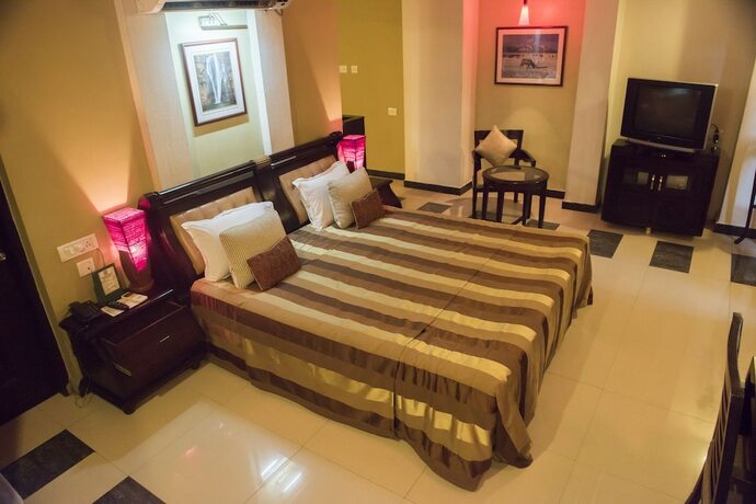 Imagen de la habitación del Hotel Pushpak. Foto 15