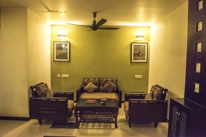 Imagen de la habitación del Hotel Pushpak. Foto 16