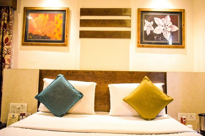 Imagen de la habitación del Hotel Pushpak. Foto 17