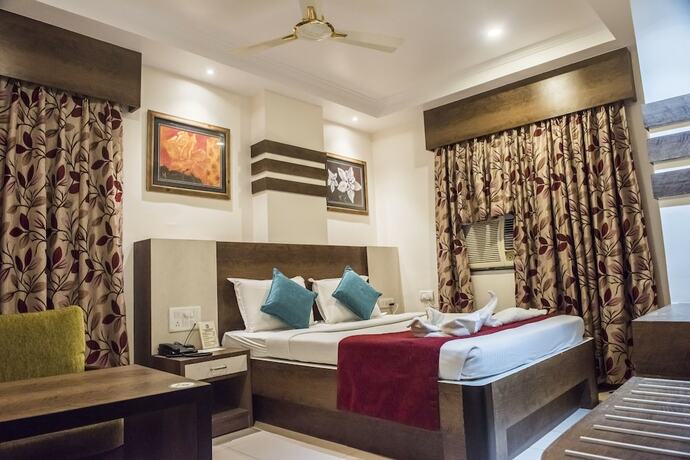 Imagen de la habitación del Hotel Pushpak. Foto 19