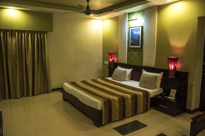 Imagen de la habitación del Hotel Pushpak. Foto 22