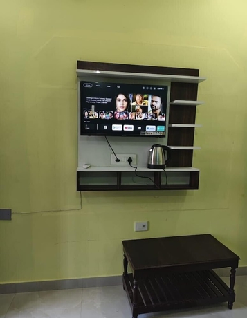 Imagen de la habitación del Hotel Pushpanjali Grand Inn. Foto 11