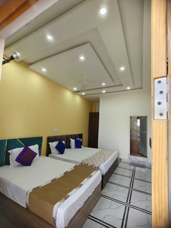 Imagen de la habitación del Hotel Pushpanjali Grand Inn. Foto 13