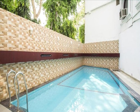 Imagen de la piscina del Hotel Pushpvilla. Foto 20