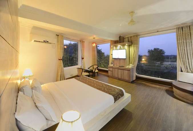 Imagen de la habitación del Hotel Pushpvilla. Foto 14