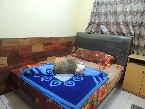 Imagen de la habitación del Hotel Puspa Indah Syariah 2. Foto 18
