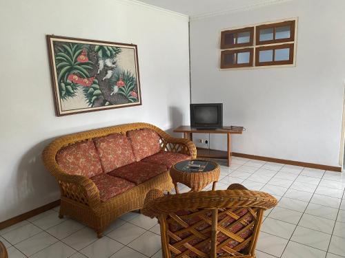 Imagen de la habitación del Hotel Puspa Sari. Foto 19