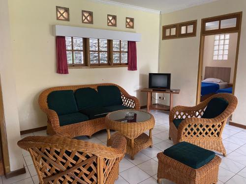 Imagen de la habitación del Hotel Puspa Sari. Foto 20