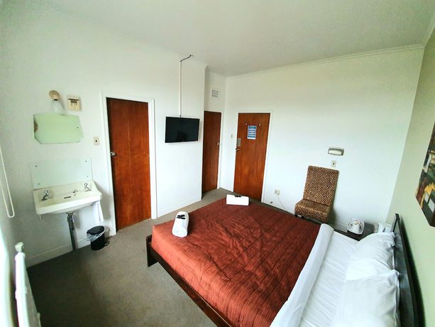 Imagen de la habitación del Hotel Putaruru. Foto 7