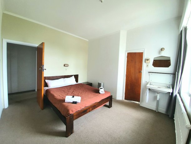 Imagen de la habitación del Hotel Putaruru. Foto 12