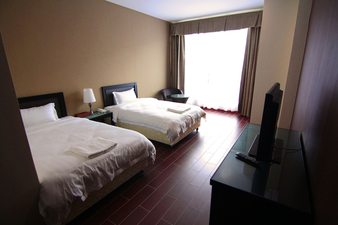 Imagen de la habitación del Hotel Putatan Platinum. Foto 9