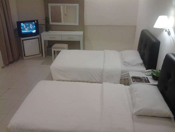 Imagen de la habitación del Hotel Puteri Garden. Foto 14