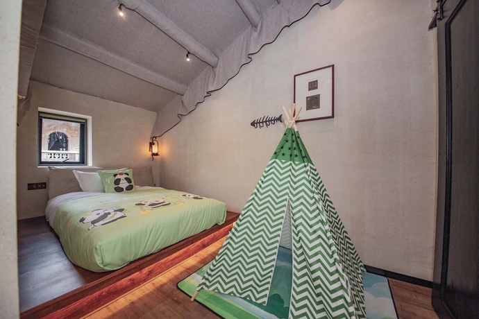 Imagen de la habitación del Hotel Putian City Meizhou Island Bolan Breeze. Foto 3
