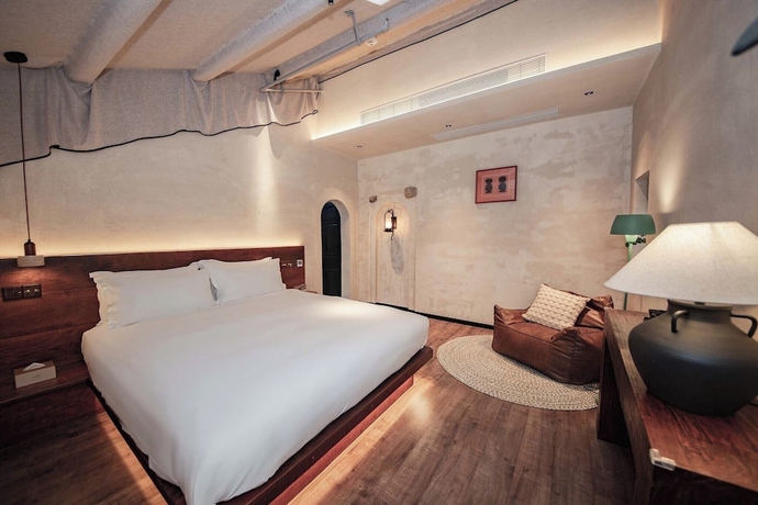 Imagen de la habitación del Hotel Putian City Meizhou Island Bolan Breeze. Foto 14