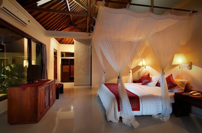 Imagen de la habitación del Hotel Putri Ayu Cottages. Foto 5