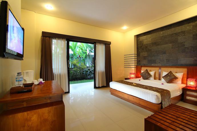 Imagen de la habitación del Hotel Putri Ayu Cottages. Foto 8