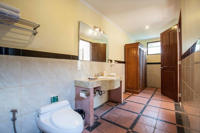 Imagen de la habitación del Hotel Putri Bali Villa. Foto 2