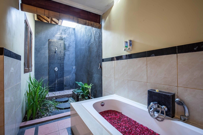 Imagen de la habitación del Hotel Putri Bali Villa. Foto 3