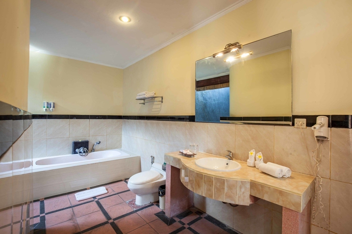 Imagen de la habitación del Hotel Putri Bali Villa. Foto 4
