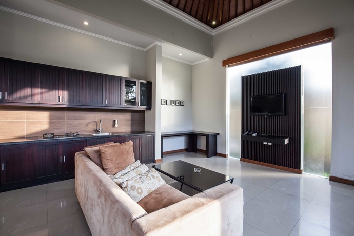 Imagen de la habitación del Hotel Putri Bali Villa. Foto 5