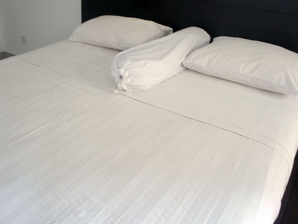 Imagen de la habitación del Hotel Putu Guest House 2. Foto 8