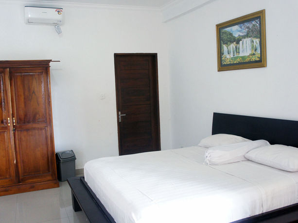 Imagen de la habitación del Hotel Putu Guest House 2. Foto 10