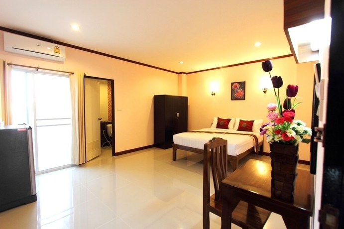 Imagen de la habitación del Hotel Puwanon Place. Foto 8