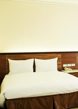 Imagen de la habitación del Hotel Puyisy Business. Foto 19