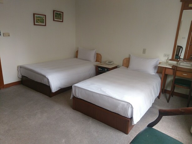 Imagen de la habitación del Hotel Puyisy Business. Foto 20
