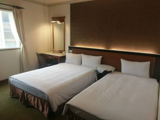 Imagen de la habitación del Hotel Puyisy Business. Foto 23