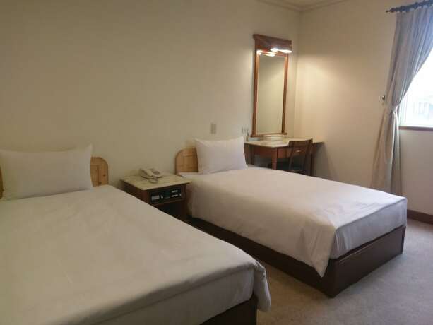 Imagen de la habitación del Hotel Puyisy Business. Foto 24