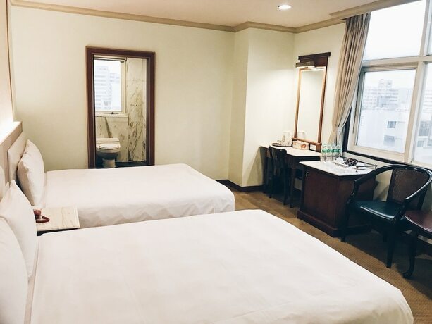 Imagen de la habitación del Hotel Puyisy Business. Foto 27