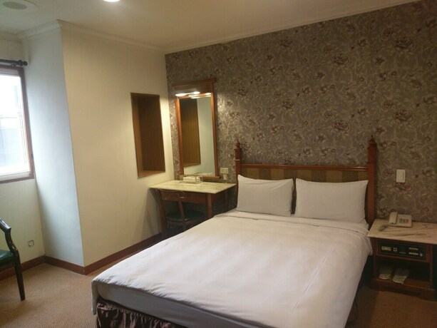 Imagen de la habitación del Hotel Puyisy Business. Foto 29