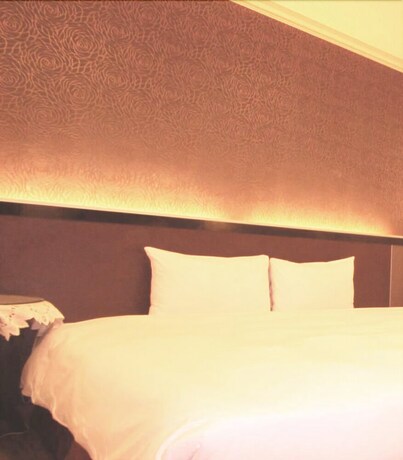 Imagen de la habitación del Hotel Puyisy Business. Foto 30