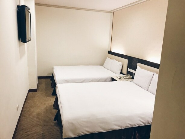 Imagen de la habitación del Hotel Puyisy Business. Foto 31