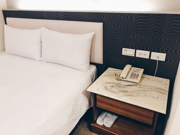 Imagen de la habitación del Hotel Puyisy Business. Foto 32