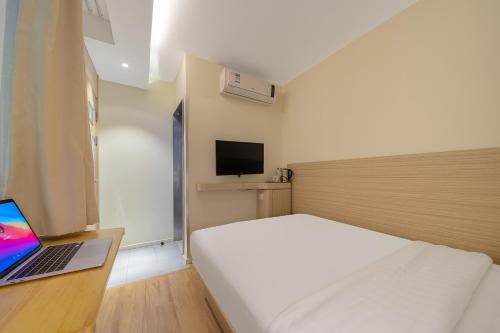 Imagen de la habitación del Hotel Puyou. Foto 15