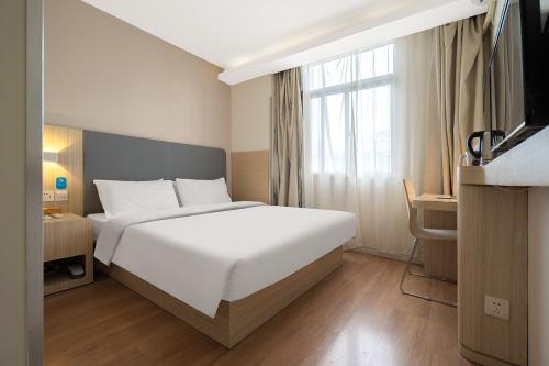 Imagen de la habitación del Hotel Puyou. Foto 16