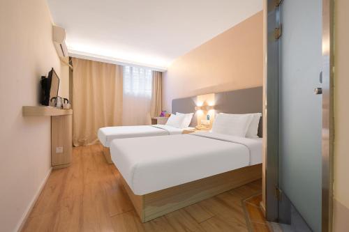 Imagen de la habitación del Hotel Puyou. Foto 17