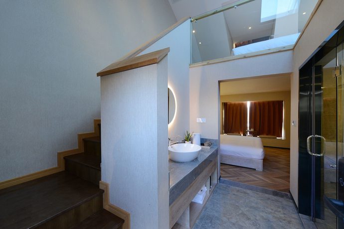 Imagen de la habitación del Hotel Puzhehei Xiyard Resort. Foto 5