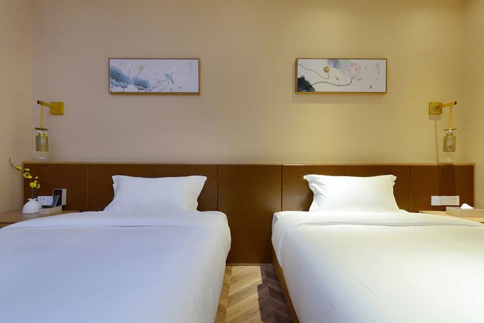 Imagen de la habitación del Hotel Puzhehei Xiyard Resort. Foto 6