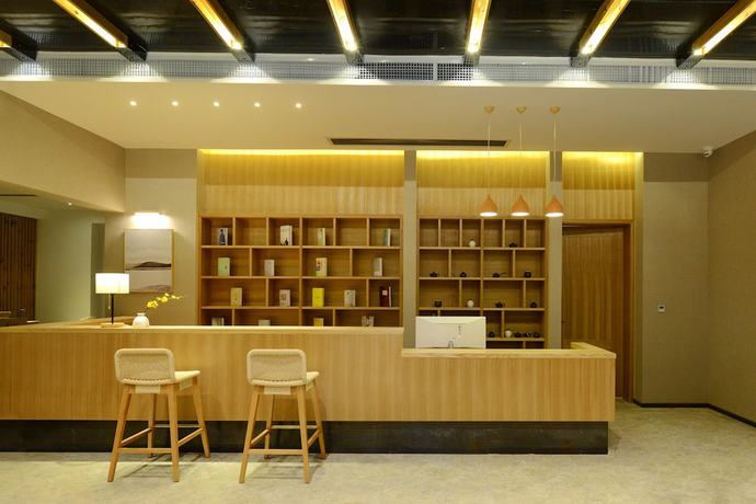 Imagen de los interiores del Hotel Puzhehei Xiyard Resort. Foto 17