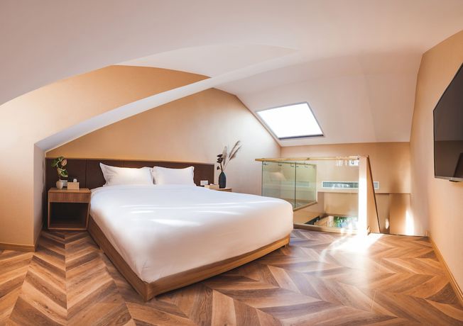 Imagen de la habitación del Hotel Puzhehei Xiyard Resort. Foto 13