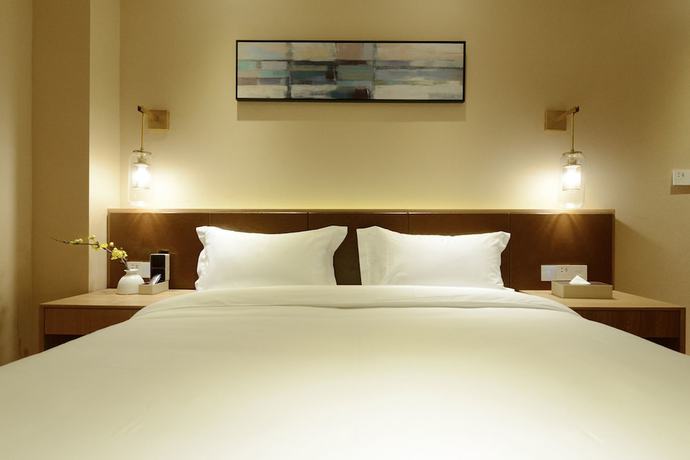 Imagen de la habitación del Hotel Puzhehei Xiyard Resort. Foto 15