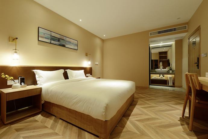 Imagen de la habitación del Hotel Puzhehei Xiyard Resort. Foto 16