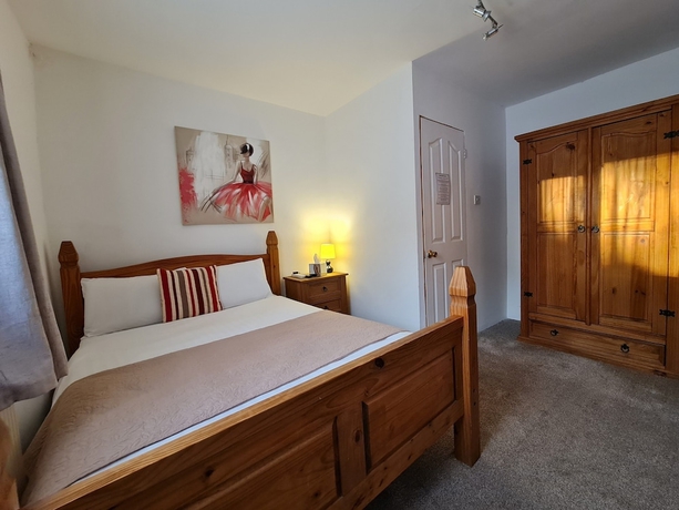 Imagen de la habitación del Hotel Pymgate Lodge. Foto 13