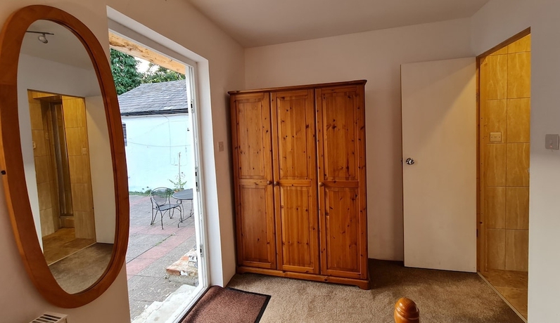 Imagen de la habitación del Hotel Pymgate Lodge. Foto 17