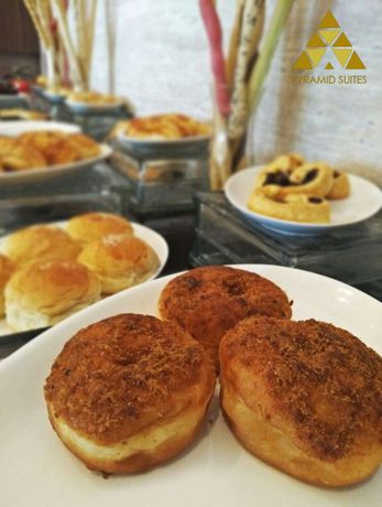 Imagen de la habitación del Hotel Pyramid Suites. Foto 14